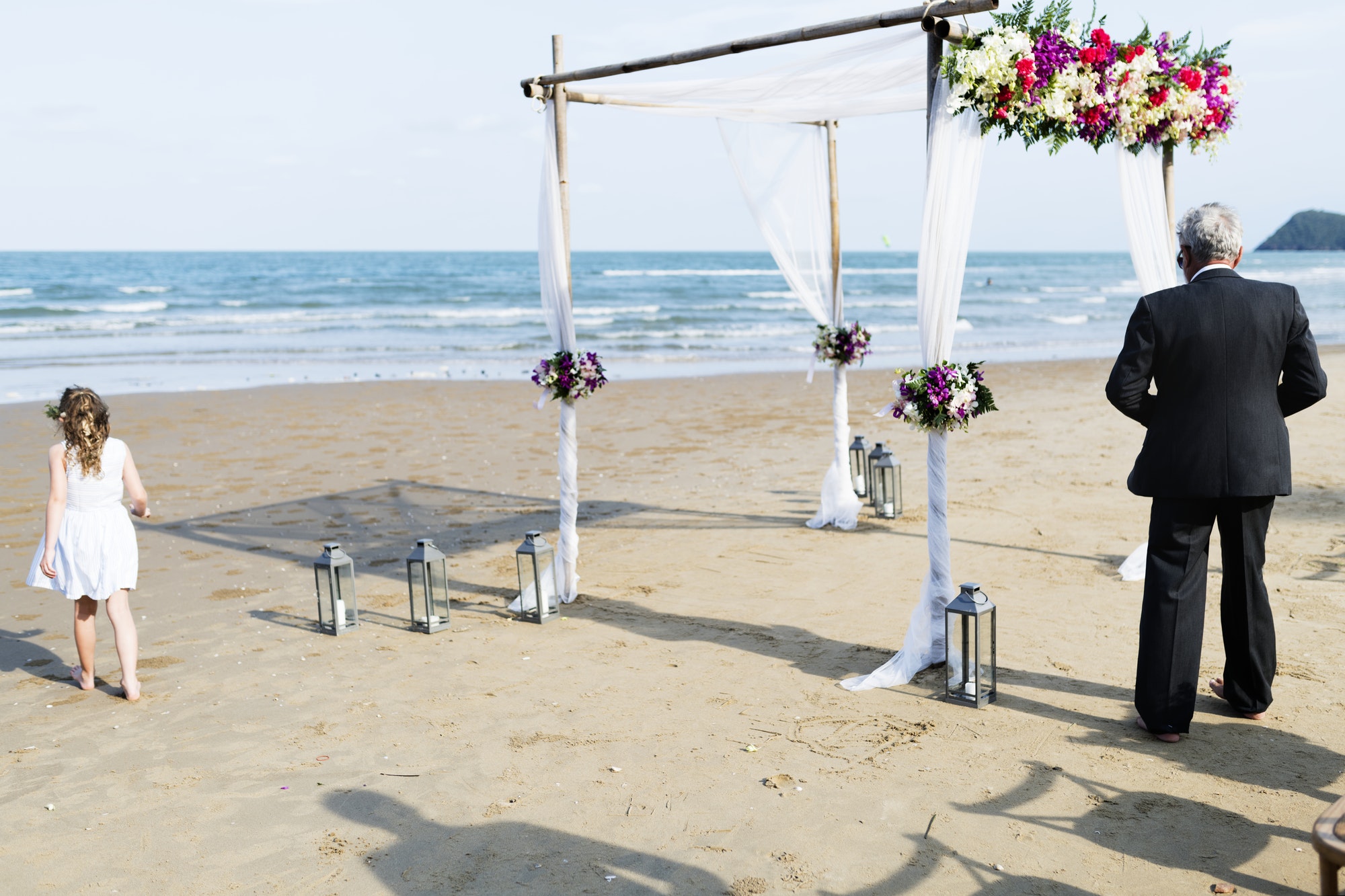 Guests at a beach wedding