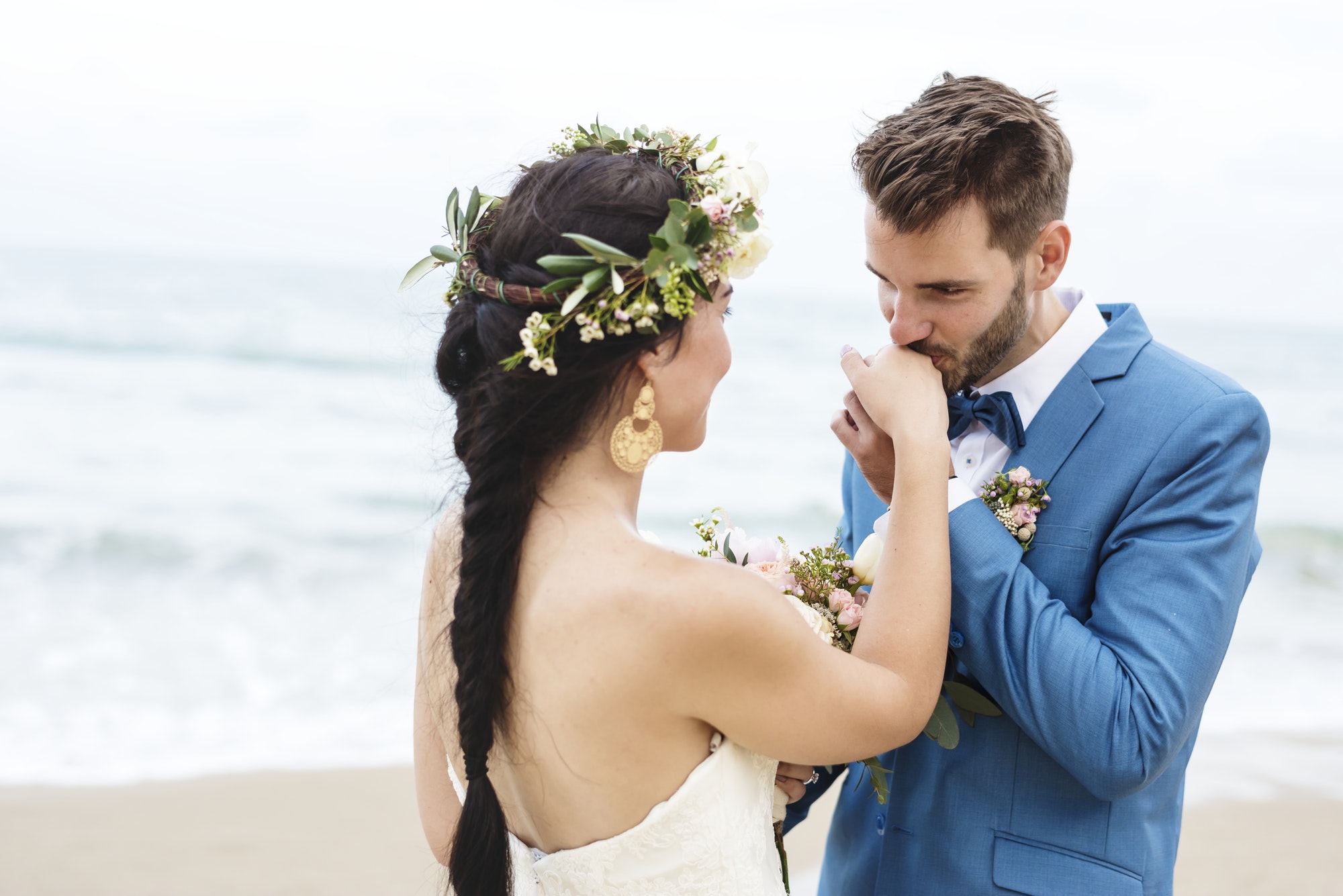 Young couple getting married at the beach